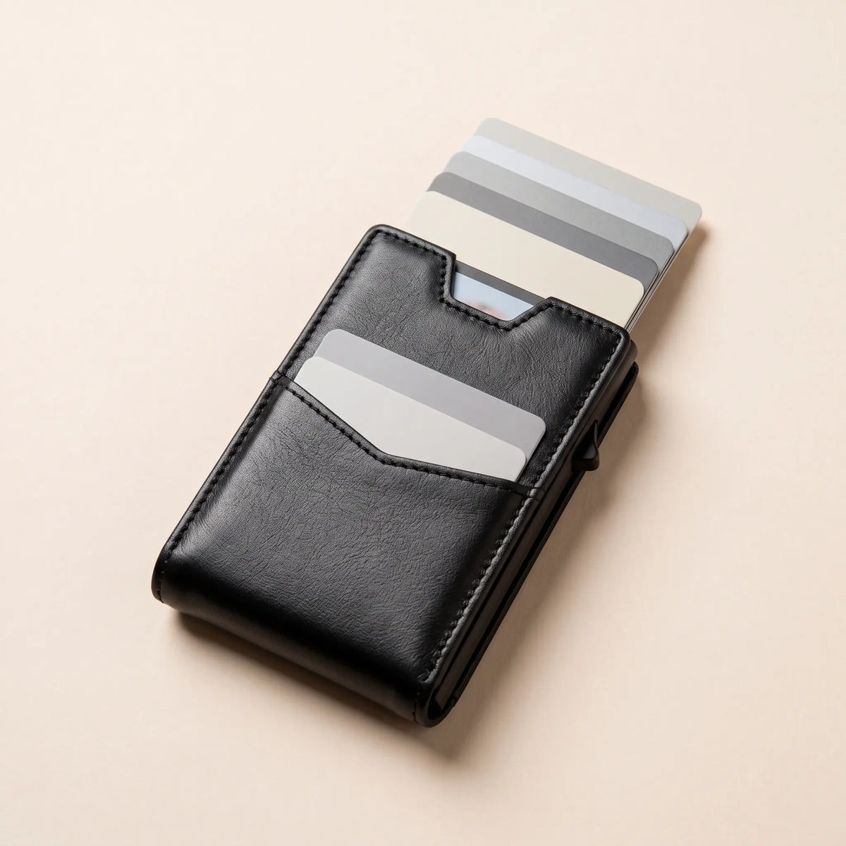 Close up of the aluminium card carrier with the stacked card edges showing